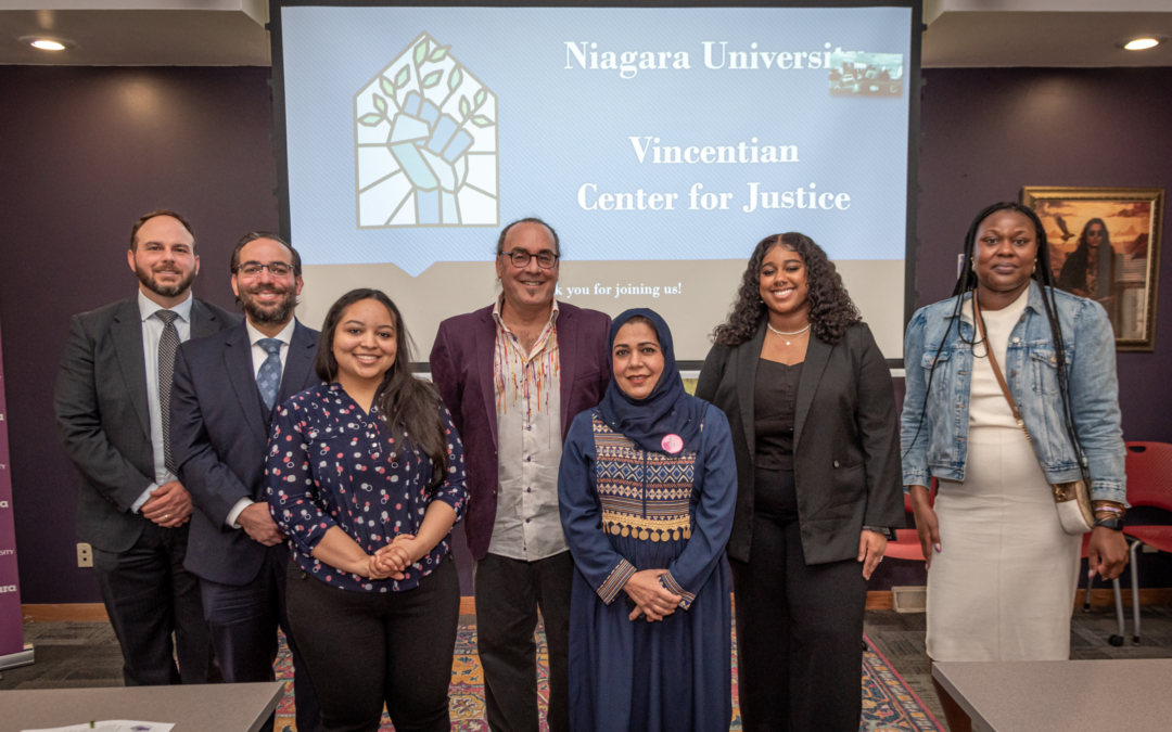 Town of Niagara Justice Anthony L. Restaino, ’05; Dr. Kevin Hinkley, ’05, assistant professor of political science; NU student Caroline LeBron; Dr. David Reilly, director of international studies; NU student Tamana Dawi; NU student Kyla Prince; and Buffalo Public Schools assistant principal Nataisia L. Johnson, ’16, M.S.Ed.’22, at the launch of the Vincentian Center for Justice.